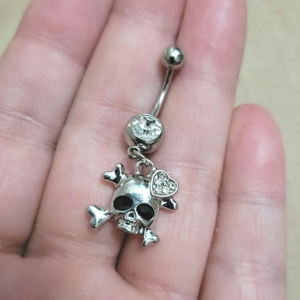 Silver tone skull & crossbones crystal belly button ring
